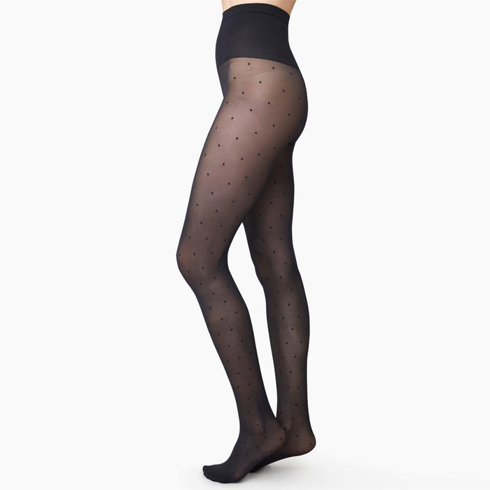 DORIS is a pair of stylish and timeless polka dot tights from Swedish Stockings.