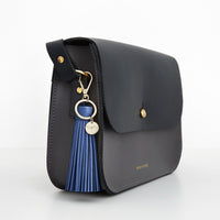 FIREFLY Sky Blue Tassel Reflector Bag Charm