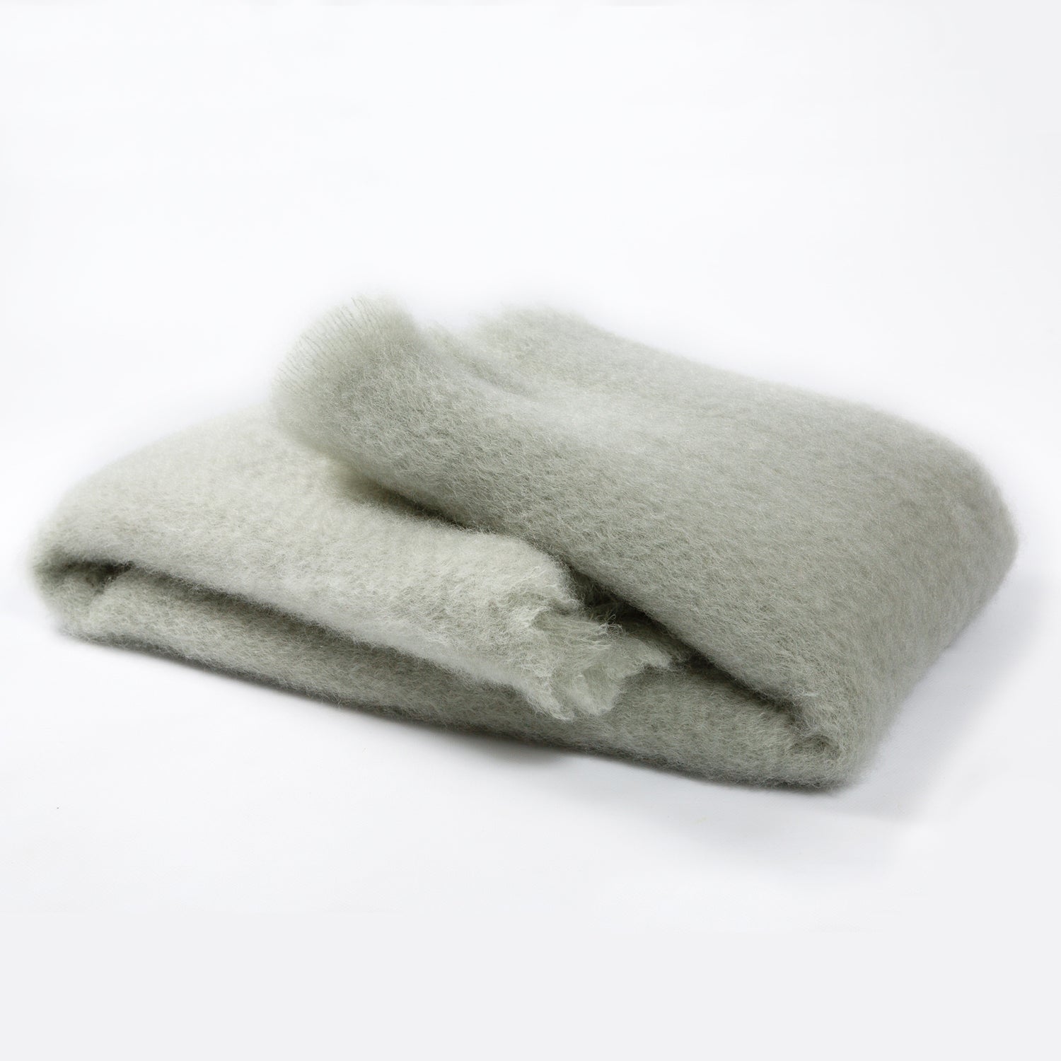 The Lisos Mohair throws from Mantas Ezcaray are distinguished by their exceptional lightness and warmth. The shine and silkiness of the fibers allow for a bright and long-lasting colour. The plush mohair fabric used to make Mantas Ezcaray's signature 'Lisos' throw is regarded as one of the most luxurious natural fibers in the world.