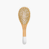 Gently detangle and smooth your locks with this beech wood brush from Bachca Paris. The brush is made with flexible pins and soft bristles that allow for thorough brushing without harmful pulling and tugging. The smaller size makes this brush perfect for travel or to keep in your purse. Also an ideal size for children.