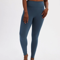 The new LUXE Legging from Girlfriend Collective is designed for both work and play with an ultra soft feel, subtle sheen, and plush heavy weight. In Lago Blue.