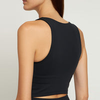 The new black Luxe scoop cropped tank from Girlfriend Collective is designed with a slight matte sheen, medium compression, and an ultra-soft, luxurious feel.