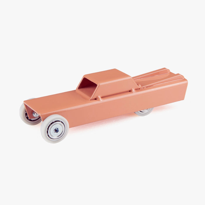 A toy American Cadillac made of Steel painted epoxy resin