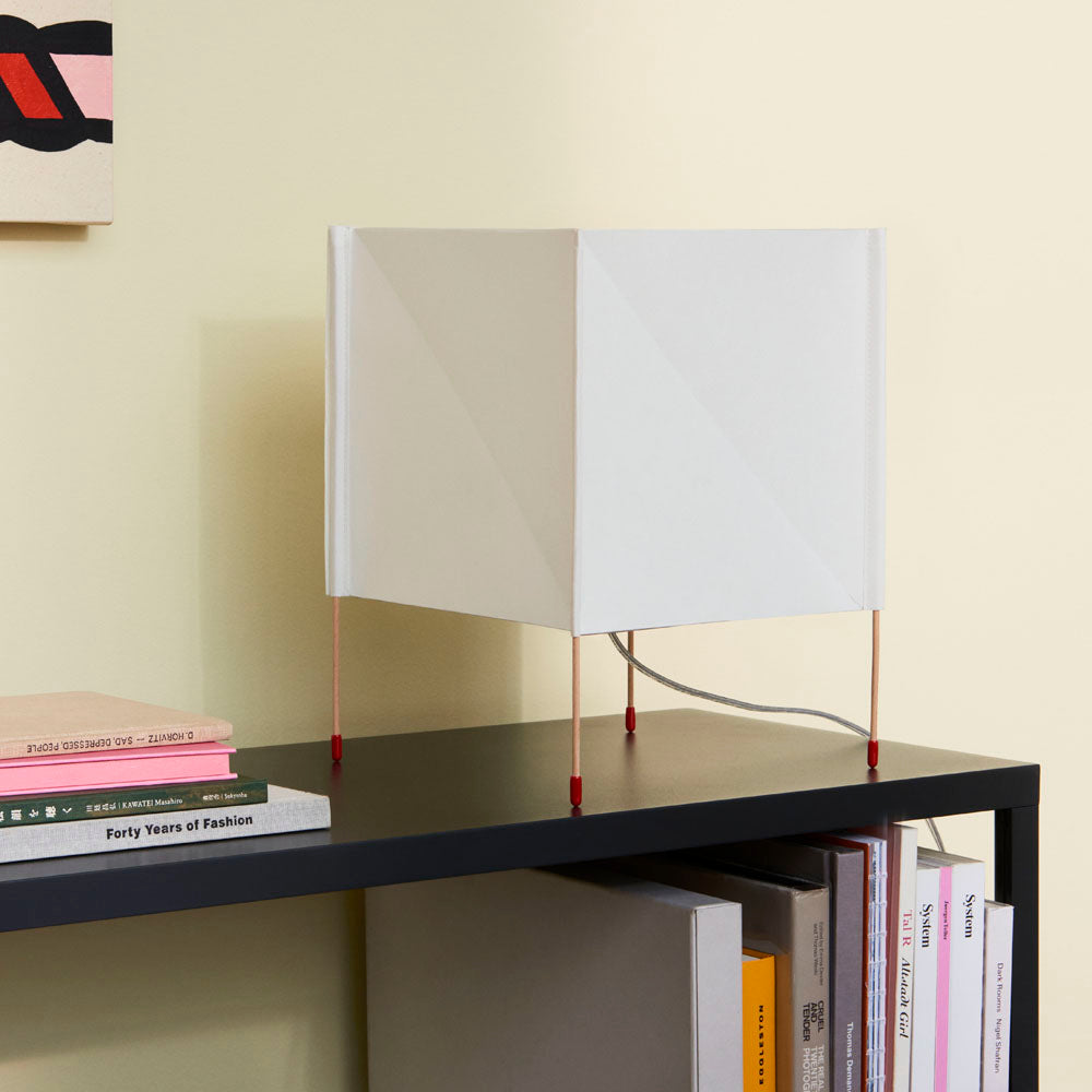 The Paper Cube Table Lamp from HAY is elegant and functional, with a warm, atmospheric light which makes it suitable for a variety of rooms at home. The clean design is inspired by the mechanics of constructing folded paper ornaments. 