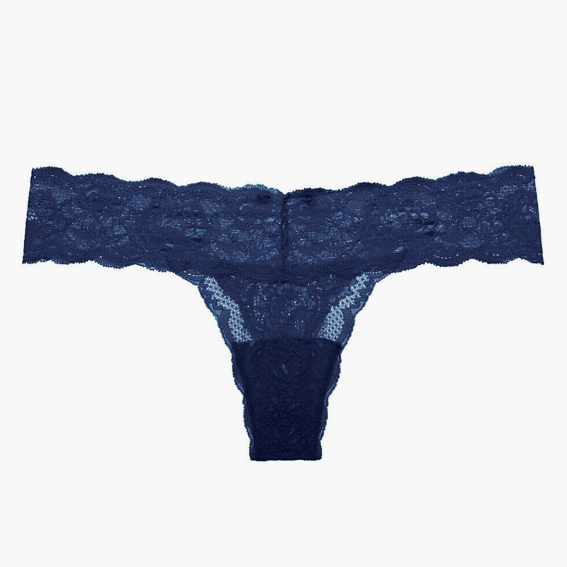 The Never Say Never Cutie low rise thong from Cosabella features a wide waistband that won't dig in or bunch and has a smoothing finish under clothes. Great for everyday wear.
