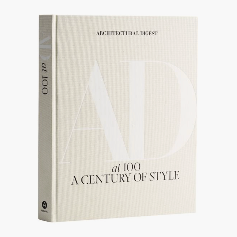 A beige table book about A rich visual history of Architectural Digest