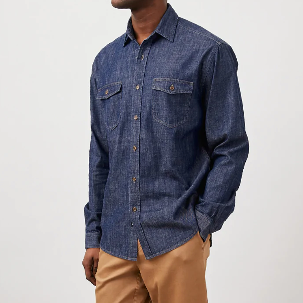 The Kenji shirt from Rails is a classic denim shirt in a beautiful dark indigo wash. The perfect piece to wear from the office to a night out with friends. This long sleeve, collared buttondown shirt features double chest flap utility pockets and slim slightly relaxed fit. 