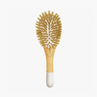 This beautiful baby hair brush from Bachca features natural bristles to gently detangle and smooth your little one's fragile hair without irritating the scalp. Suitable for all types of baby hair. The chic packaging makes it a great baby gift.