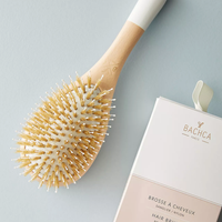 Gently detangle and smooth your locks with this beech wood brush from Bachca Paris. The brush is made with flexible pins and soft bristles that allow for thorough brushing without harmful pulling and tugging. The smaller size makes this brush perfect for travel or to keep in your purse. Also an ideal size for children.