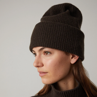 The Stockholm Cashmere Hat in chocolate brown from LISA YANG is a classic rib knit beanie, framed by an oversized turn-up cuff. Made from premium soft and airy cashmere. Unisex styling makes this a family favorite. Adjust the fold-over cuff to find your perfect fit. 