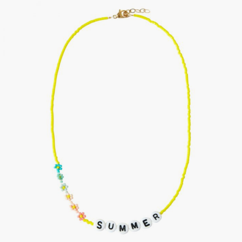 The SUMMER Necklace from French label Bbuble is a chic and colorful necklace made from yellow miyuki beads and white letter beads. Six small multi-color daisies are nicely arranged around the SUMMER beads. All bracelets from Bbuble are handmade in their Parisian workshop. 