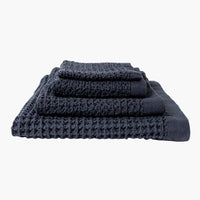 Waffled hand towel in navy blue
