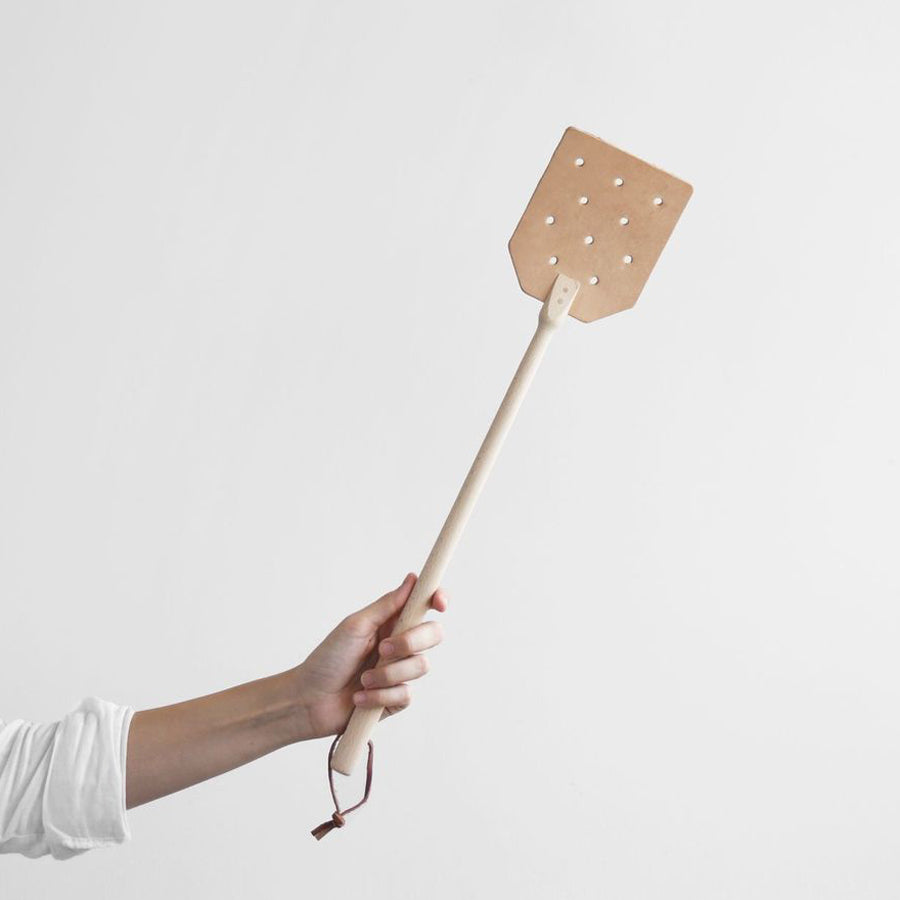 This fly swatter from Redecker has a durable oiled beechwood handle and a high quality flexible leather head, an example of a functional product made beautiful. 